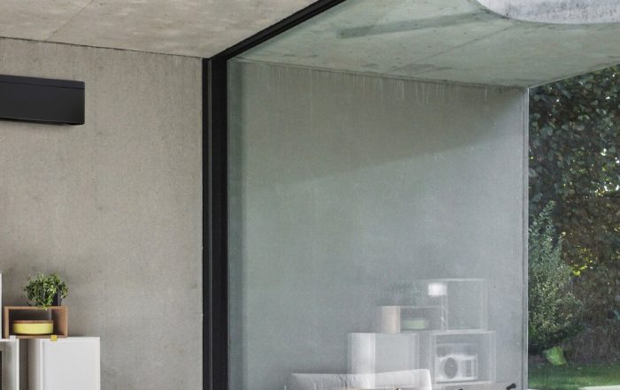 Installation climatisation réversible murale dans une maison du Rhône par technicien RGE Aslane
